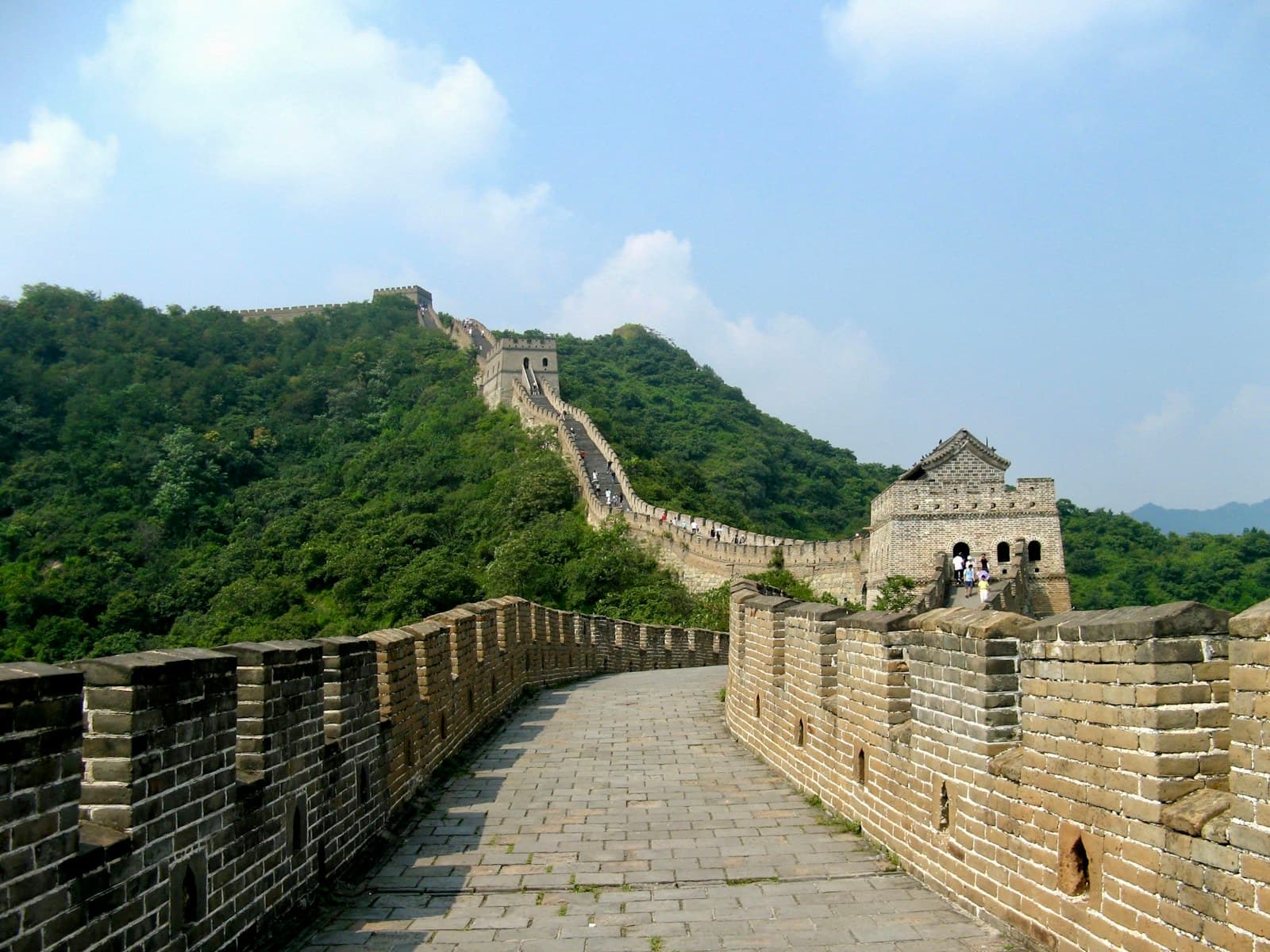 The Great Wall crossing green mountains at Mutianyu
